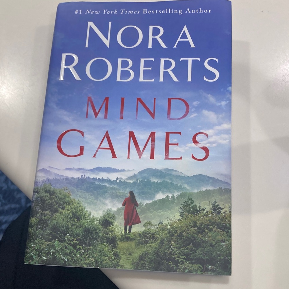 'Mind Games' Novel with Blue Cover